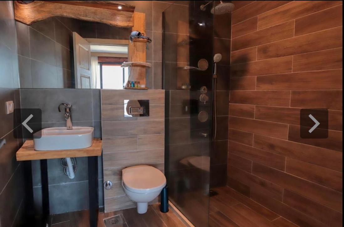 Qcunda Otel Айвалык Номер фото